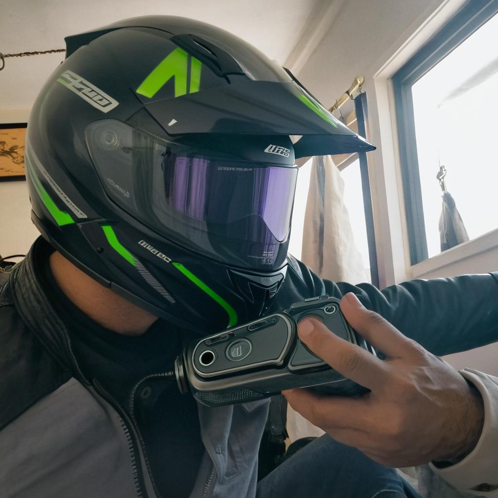 Capture Your Adventure: Thrilling Selfie with a Green Motorcycle Helmet